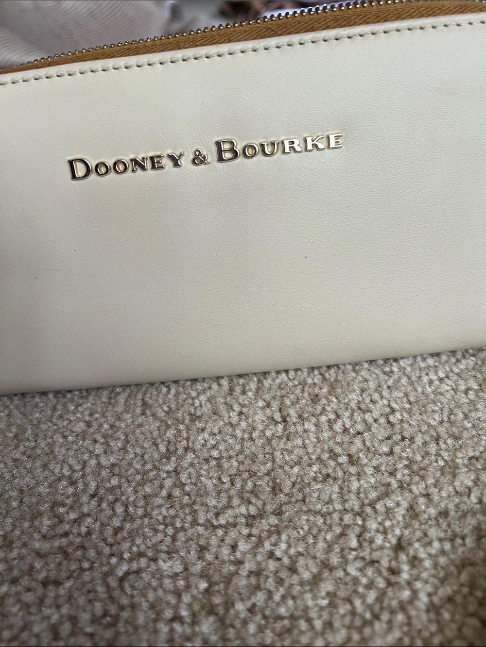 Dooney & Bourke Cream Leather Zip Wristlet with Gold Logo